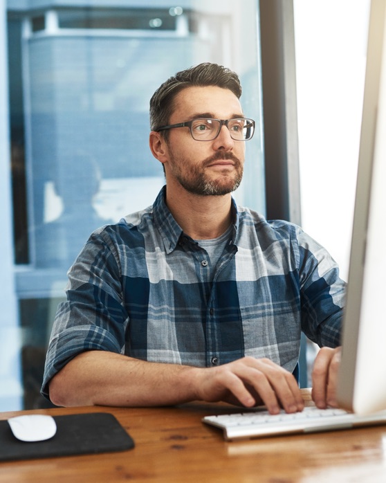 Screen printer pulling shirt from dryer